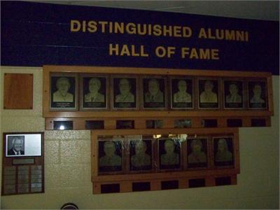All the Distinguished Inductees' plaques are located on the walls outside of the Media Center in the High School.