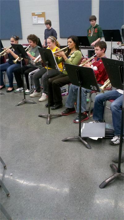 Fox 8 News Reporter Annette Lawless plays trumpet with the 7th Grade Band! 